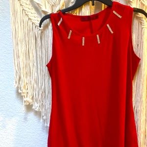 Beautiful cranberry  top with rhinestone detail!